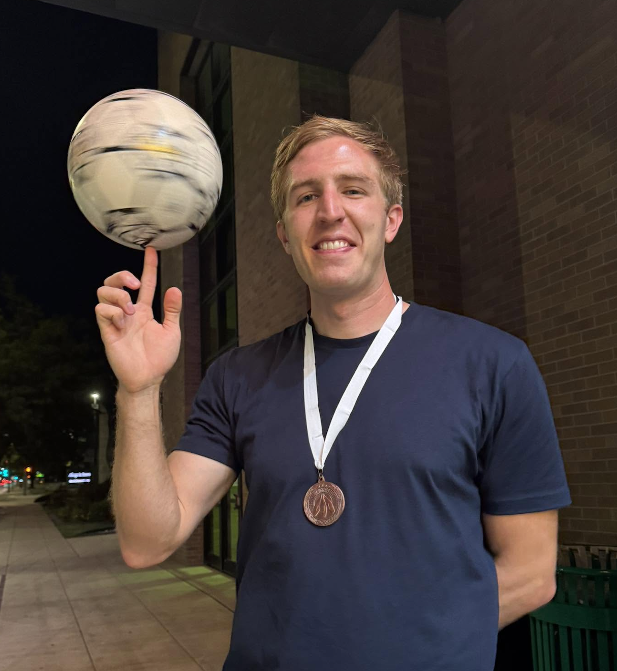 Cory Black celebrates after earning the bronze medal at the 2026 International Jugglers&rsquo; Association Championships.