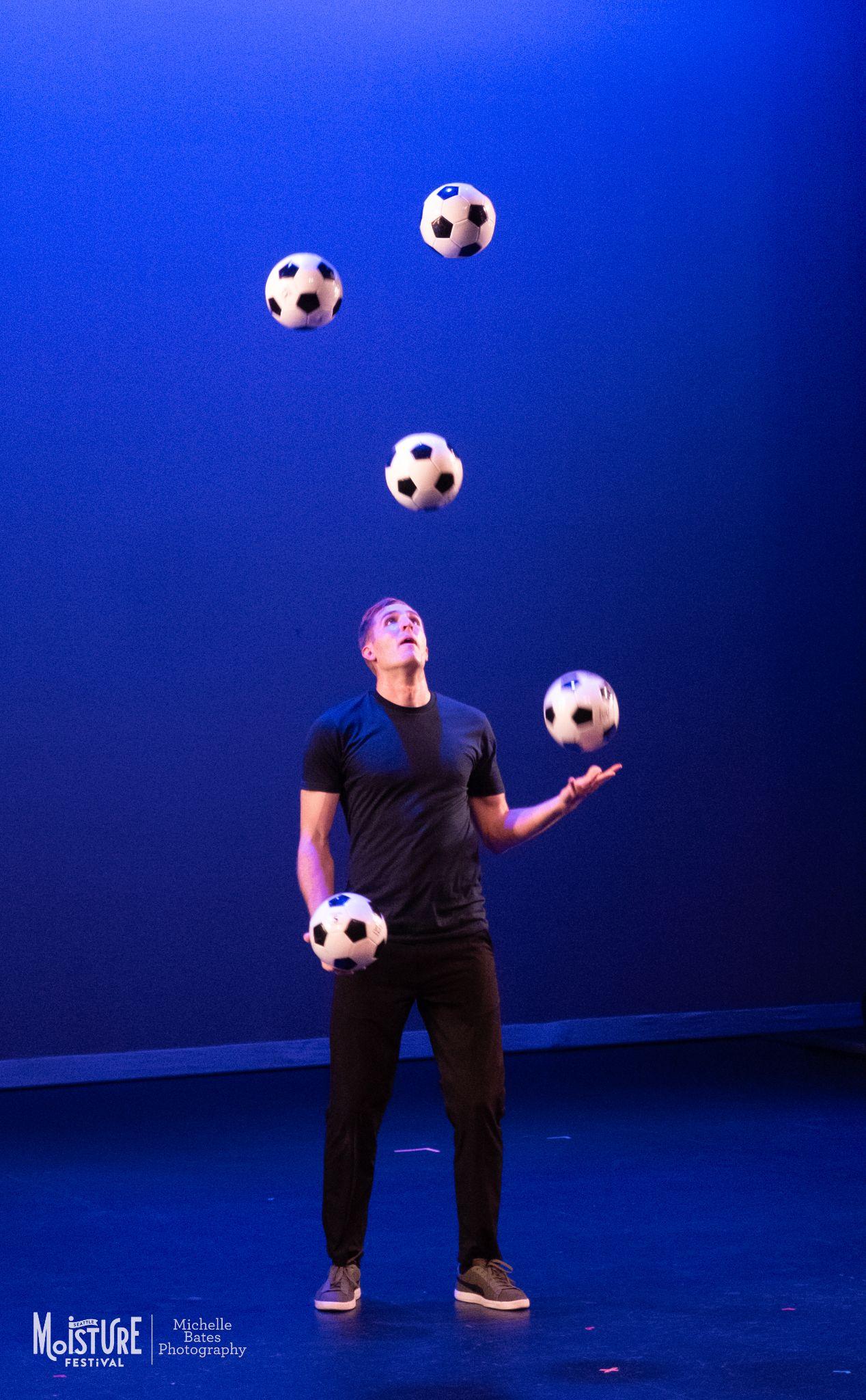 Cory Black performs his freestyle football and juggling act at the 2026 Moisture Festival in Seattle.